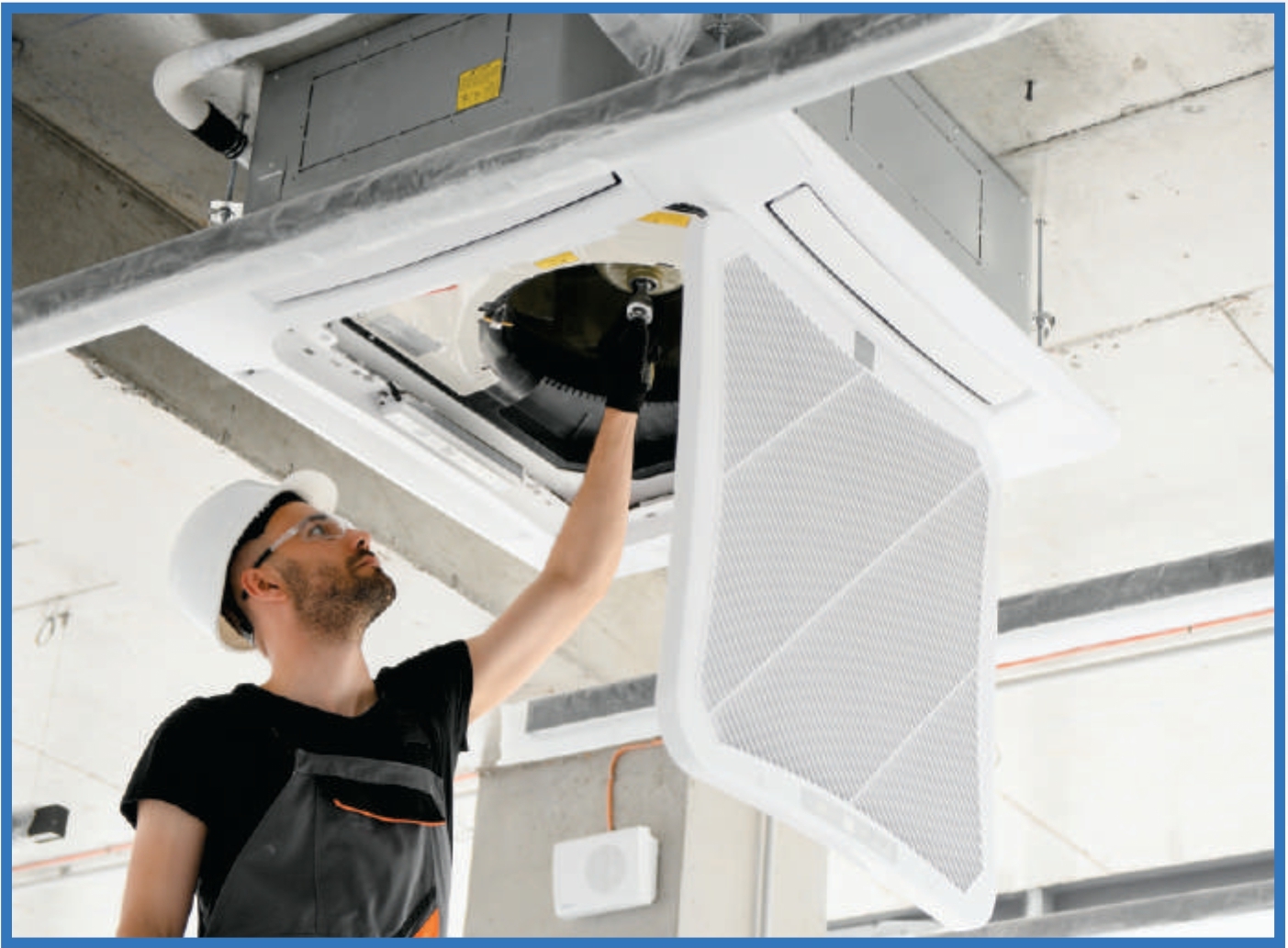 Technician inspecting HVAC system